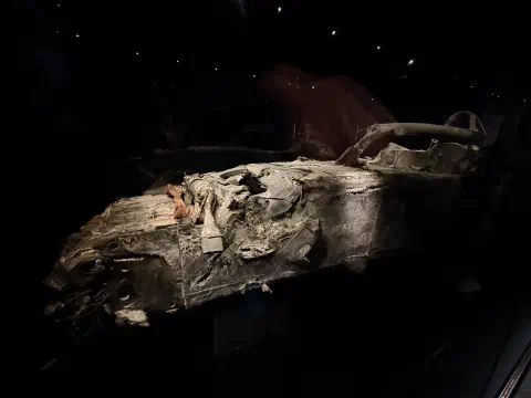A photo of the charred remains of Romain Grosjean’s Haas VF-20