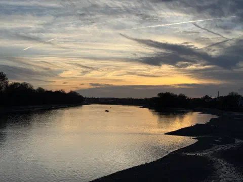 A view across the River Thames in London at sunset