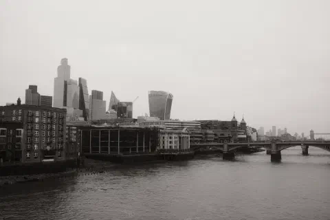 A view east over London from Millennium Bridge. In the distance you can see London Bridge and Tower Bridge.