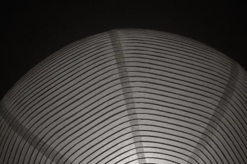 a black and white photo of a lampshade