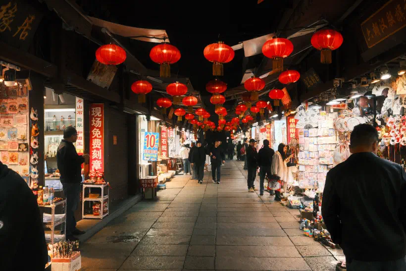 a relatively quiet market street at night
