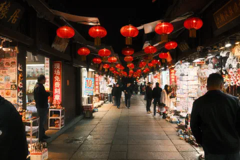 a relatively quiet market street at night